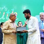 Prime Minister Muhammad Shehbaz Sharif distributes laptops among the high achievers of public sector universities under the PM's Youth Laptop Scheme at Bahauddin Zakaria University