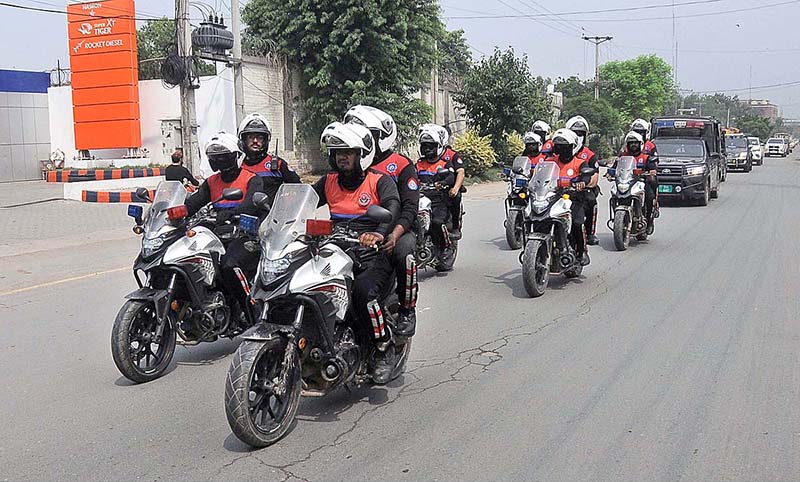 Security officials holding flag march to develop a sense of protection among the masses and maintain law and order situation during the holy month of Muharram ul Haram