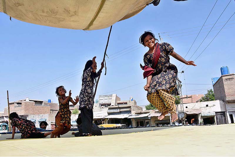 Girls enjoying on jumping-jack at Nazar Muhalla