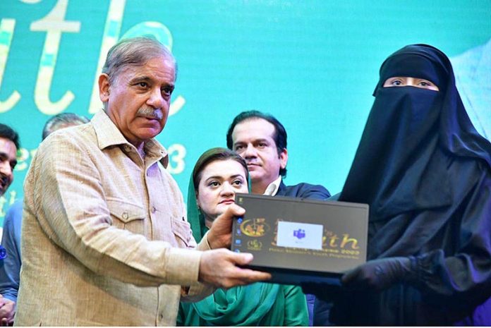 Prime Minister Muhammad Shehbaz Sharif distributes laptops among the high achievers of public sector universities under the PM's Youth Laptop Scheme at Bahauddin Zakaria University