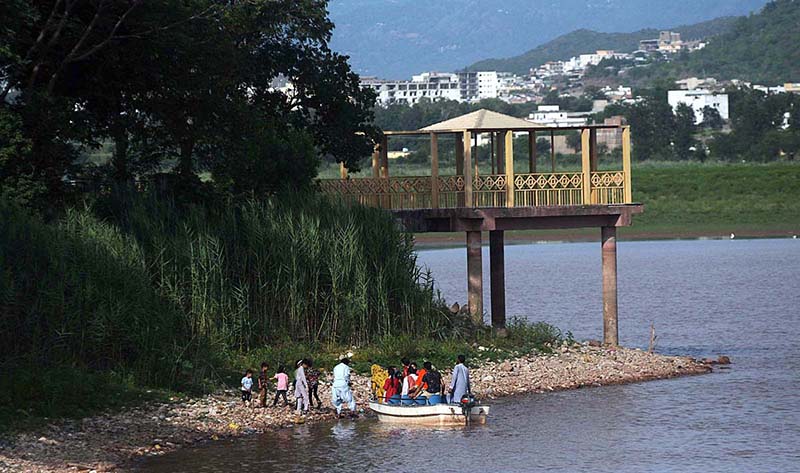 A large number of people visiting Rawal Lake View Park in a pleasant day in the city