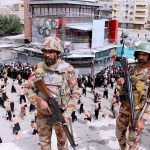 Security personnel high alert during the main procession of 10th Muharram-ul-Haram. Ashoura is the commemoration marking the Shahadat (death) of Hussein (AS), the grandson of the Prophet Muhammad (PBUH), with his family members during the battle of Karbala for the upright of Islam