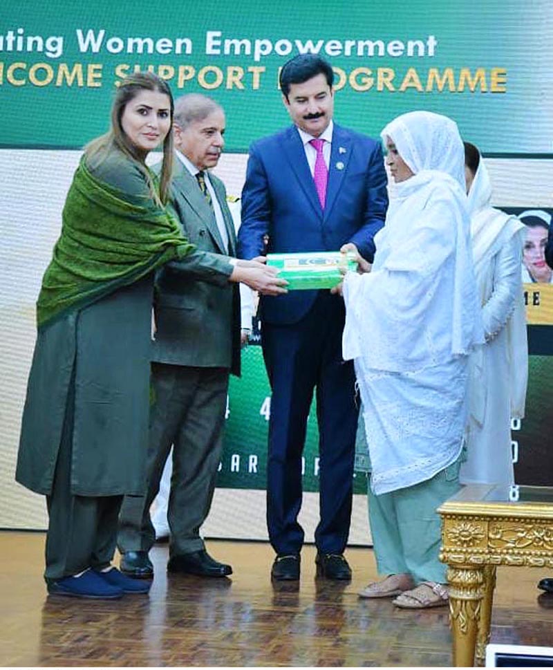 Prime Minister Muhammad Shehbaz Sharif distributing smart cards and cheque books relating to Benazir Social Protection Account among the beneficiaries