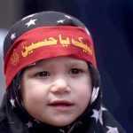 A minor girl attends the procession of 9th Muharramul Harram observing Youm e Ashur at Sadar Bazar. Muharram ul Harram, the first month of the Islamic calendar is known as the mourning month to pay homage in remembrance of the martyrdom (Shahadat) of Hazrat Imam Hussain (AS), the grandson of the Holy Prophet Mohammad (SAWW), along with his family members and companions at the battle of Karbala