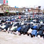 A large number of Shiite Muslims perform Zohrain prayers during the 10th Muharram procession to mark Ashoura at Meezan Chowk. Ashoura is the commemoration marking the Shahadat (death) of Hussein (AS), the grandson of the Prophet Muhammad (PBUH), with his family members during the battle of Karbala for the upright of Islam