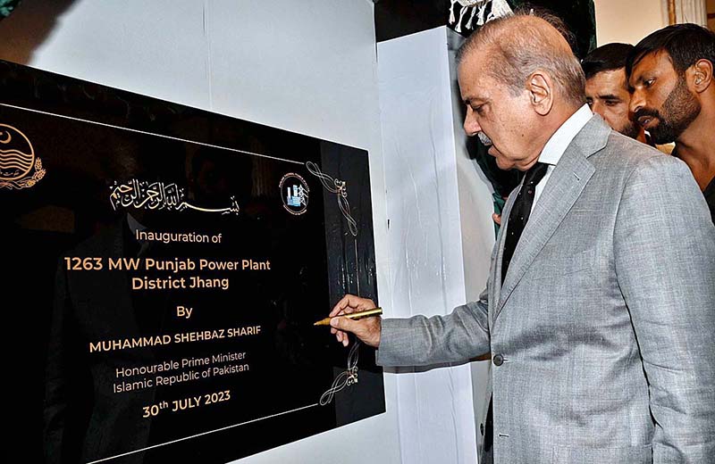 Prime Minister Shahbaz Sharif signing on the inaugural plaque after launching 1263MW Punjab Power Plant District Jhang.