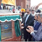 Mr. Ahsan Iqbal Federal Minister for Ministry of Planning Development & Special Initiatives unveiling the plaque to inaugurate Nisar Fatima Auditorium and Jamia Masjid UET