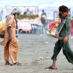 Street vendors selling candies for kids at sea view to earn bread and butter