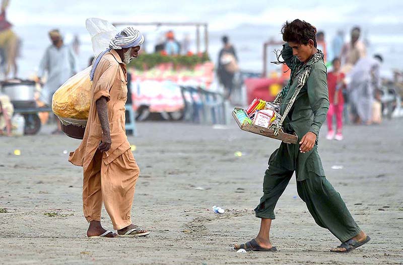 Street vendors selling candies for kids at sea view to earn bread and butter