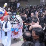 A large number of mourners touch Zuljinnah during the Aashura procession at Mumtazabad on 9th Muharram-ul-Haram in remembrance of the martyrdom (Shahadat) of Hazrat Imam Hussain (AS), the grandson of the Holy Prophet Mohammad (SAWW) and other martyrs of Karbala incident