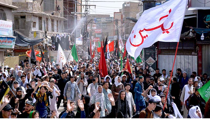 A large number of Shiite Muslims perform Zohrain prayers during the 10th Muharram procession to mark Ashoura at Meezan Chowk. Ashoura is the commemoration marking the Shahadat (death) of Hussein (AS), the grandson of the Prophet Muhammad (PBUH), with his family members during the battle of Karbala for the upright of Islam
