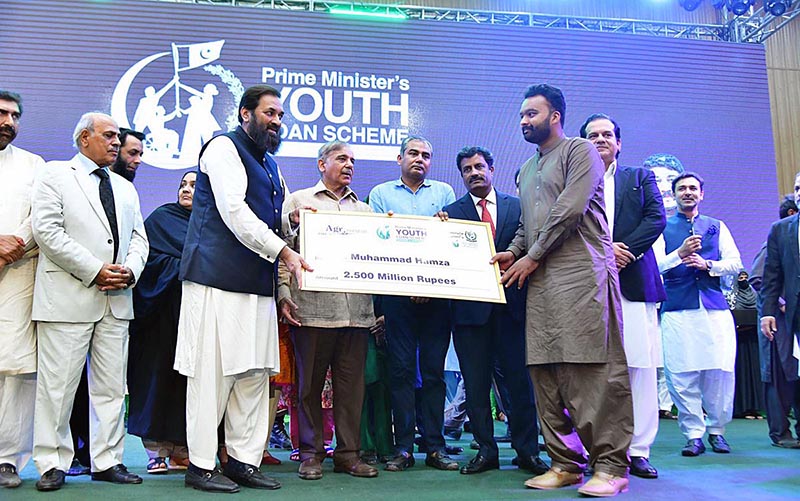 Prime Minister Muhammad Shehbaz Sharif distributes cheques among the successful candidates who received loans under Prime Minister's Youth Loan Scheme