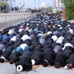 A large number of mourners offering Namaz-e-Zohar during main procession of Ashura on 9th of the Holy Month of Muharram-ul-Haram at M.A Jinnah Road. Muharram ul Harram known as the first month of the Islamic calendar and the mourning month in remembrance of the martyrdom (Shahadat) of Hazrat Imam Hussain (AS), the grandson of the Holy Prophet Mohammad (SAWW) along with his family members and Shuhda-e-Karbala