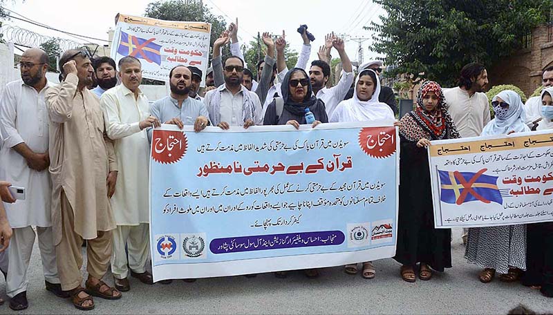 Ehsas Welfare organization and All Civil Societies take part in a protest demonstration in front of Press Club against the burning of holy Quran outside a Stockholm Mosque