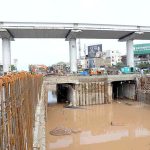 After heavy rain in the city, water has accumulated in the under-construction Samanabad Underpass