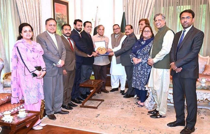 A delegation of Old Ravian Association in a group photo with Prime Minister Muhammad Shehbaz Sharif