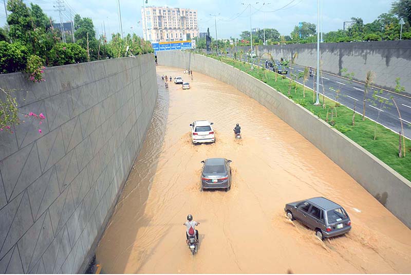 After heavy rain in the city, water has accumulated in the under-construction Samanabad Underpass