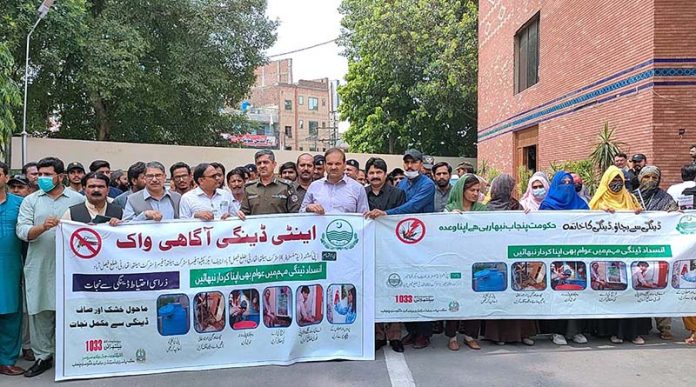Deputy Commissioner Ali Anan Qamar and CPO Usman Akram Gondal leads an awareness walk on Anti Dengue Day at TMAF