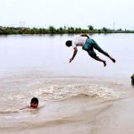 Youngsters diving in Rice Canal to get relief from scorching hot weather