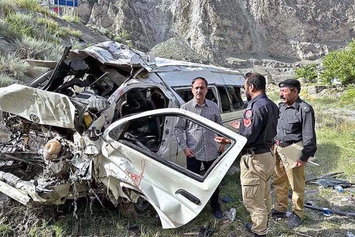 A view of wreckage hiace after plunged into deep near Nasirabad check post resulting 2 person died and 8 persons injured