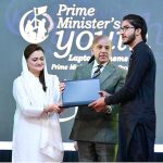 Prime Minister Muhammad Shehbaz Sharif distributing laptops among high achievers of public sector university students under the Prime Minister's Youth Laptop Scheme
