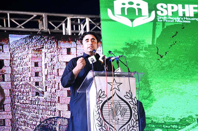 Chairman PPP and Foreign Minister Bilawal Bhutto Zardari handing over the land titles to flood affectees people in a ceremony at Dhamra Village