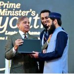 Prime Minister Muhammad Shehbaz Sharif distributing laptops among high achievers of public sector university students under the Prime Minister's Youth Laptop Scheme