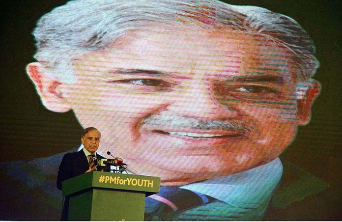 Prime Minister Muhammad Shehbaz Sharif addressing an event of Laptop And Loan Cheques Distribution under the PM's Youth Laptop Scheme 2023 at the Sindh Governor House