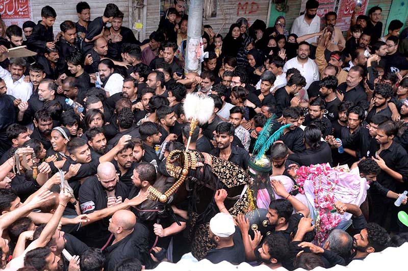 A large number of Shiite Muslims attend the 10th Muharram procession to mark Ashoura. Ashoura is the commemoration marking the Shahadat (death) of Hussein(AS), the grandson of the Prophet Muhammad(PBUH), with his family members during the battle of Karbala for the upright of Islam