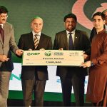 Prime Minister Muhammad Shehbaz Sharif distributing cheques among the recipients of Prime Minister’s Youth Business and Agriculture Loan Scheme at the Sindh Governor House