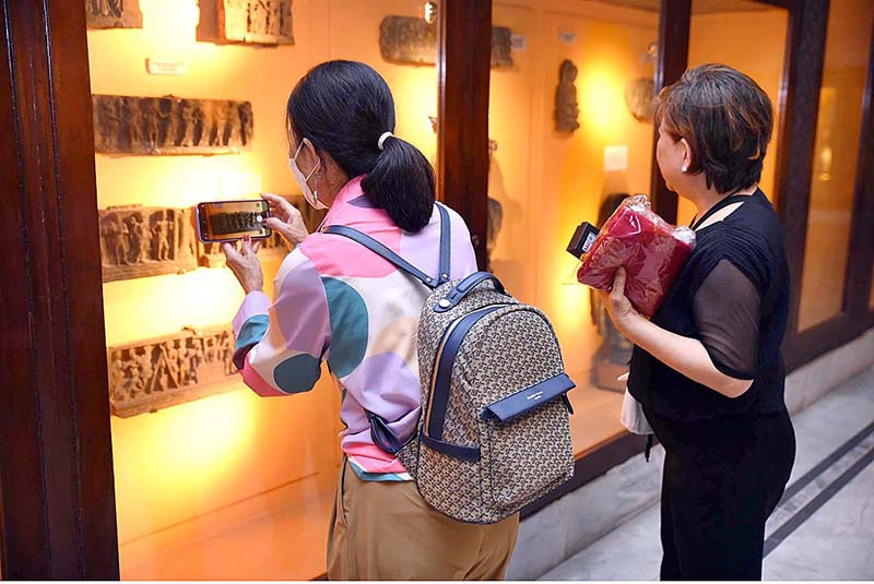 Monks from different countries visit Peshawar Museum to see the remains of Buddha's