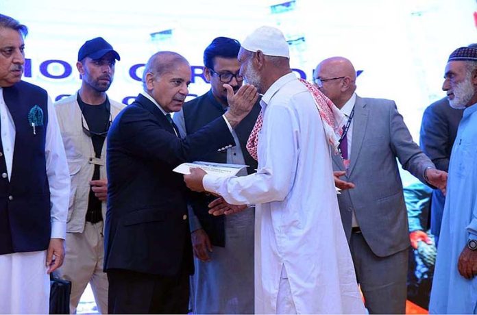Prime Minister Muhammad Shehbaz Sharif distributes cheques among the fishermen of Gwadar.