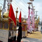 Vendors displaying Ashura related stuff during 9th Muharram-ul-Harram procession at Sharbat Chowk
