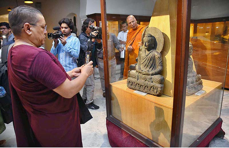 Monks from different countries visit Peshawar Museum to see the remains of Buddha's