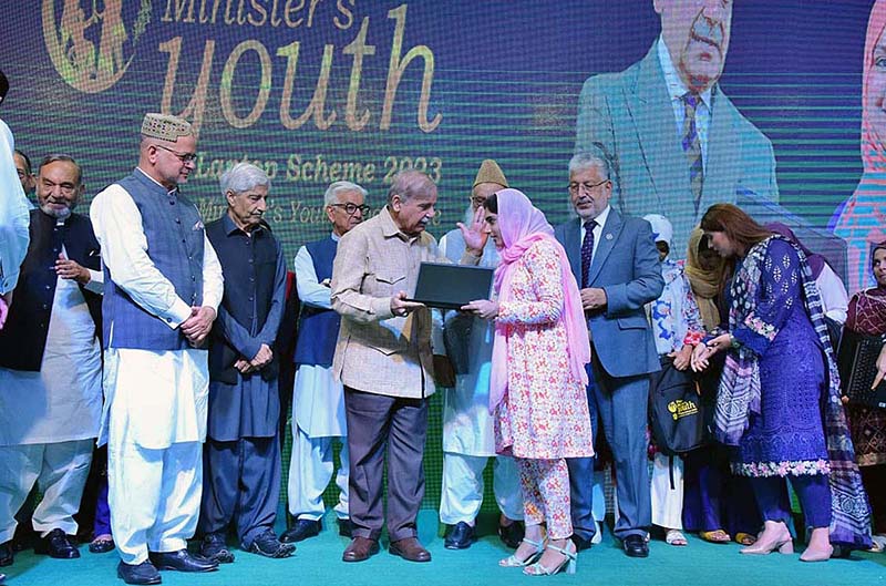 Prime Minister Muhammad Shehbaz Sharif distributes laptops among the high achievers of public sector universities under the PM’s Youth Laptop Scheme