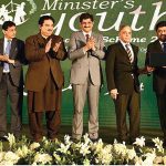 Prime Minister Muhammad Shehbaz Sharif distributing laptops among high achievers of public sector university students under the Prime Minister's Youth Laptop Scheme at the Sindh Governor House