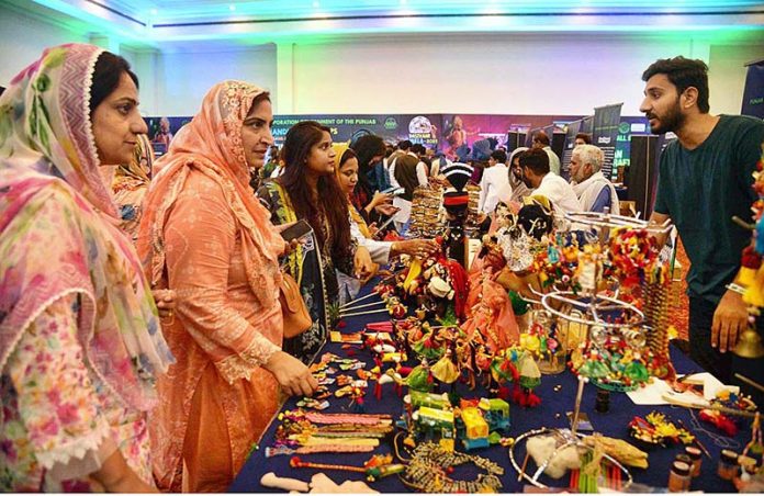 Women participating in the Dastkar Mela organized by Punjab Small Industry at the local hotel