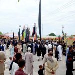 Mourners attending Tazia and Alam procession on 9th Muharram ul Haram passing through its route