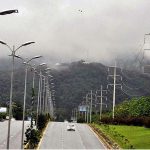 A view of clouds hovering over the Margalla Hills during rain in Federal Capital.