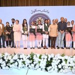 Prime Minister Muhammad Shehbaz Sharif in a group photo with high-achievers of Danish schools on the ceremony of merit-based distribution of laptops among high-achievers under the Prime Minister’s Laptop initiative