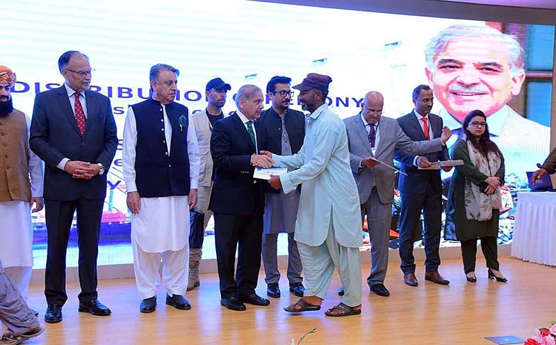 Prime Minister Muhammad Shehbaz Sharif distributes cheques among the fishermen of Gwadar