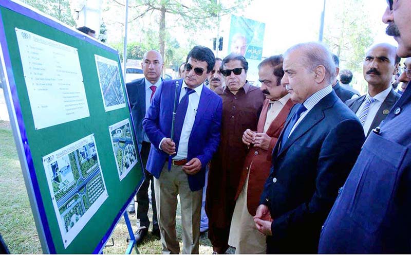 Prime Minister Muhammad Shehbaz Sharif being briefed about the Shaheen Chowk Flyover project
