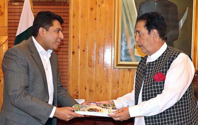 Secretary Finance Gilgit-Baltistan Faisal Pirzada presenting copy of Budget 2023-2024 to Governor Gilgit-Baltistan Syed Mehdi Shah at Governor Secretariat