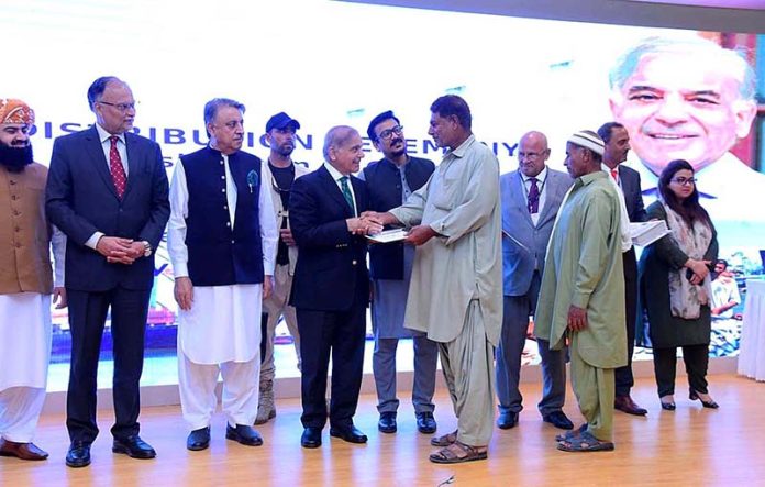 Prime Minister Muhammad Shehbaz Sharif distributes cheques among the fishermen of Gwadar.