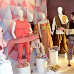 Visitors taking keen interest in handmade crafts during an exhibition