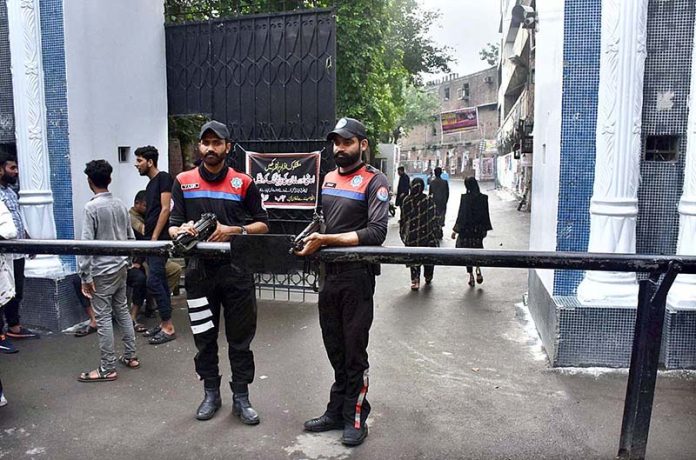 Security Official standing high alert outside the Karbala Gamay Shah to avoid any incident during the Holy Month of Muharram-ul-Haram.