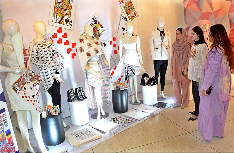 Visitors taking keen interest in handmade crafts during an exhibition