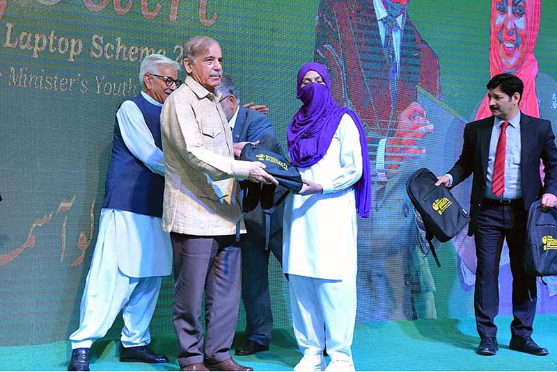 Prime Minister Muhammad Shehbaz Sharif distributes laptops among the high achievers of public sector universities under the PM’s Youth Laptop Scheme
