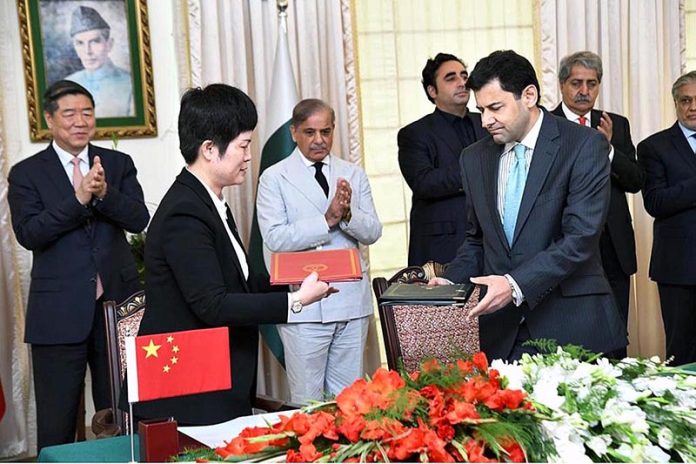 Prime Minister Muhammad Shehbaz Sharif and Vice -Premier of State Council of China He Lifeng witnessing the signing ceremony of agreements/MoUs signed between the two countries in various fields