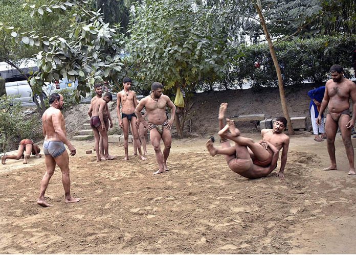 Wrestlers practice the cultural and traditional sport of Punjab (''Shahi Dangal'') wrestling at Nasir Bagh near Lohari Gate